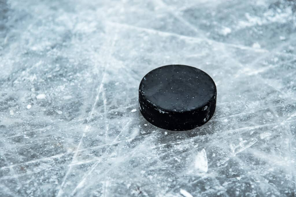 Two Hockey Pucks